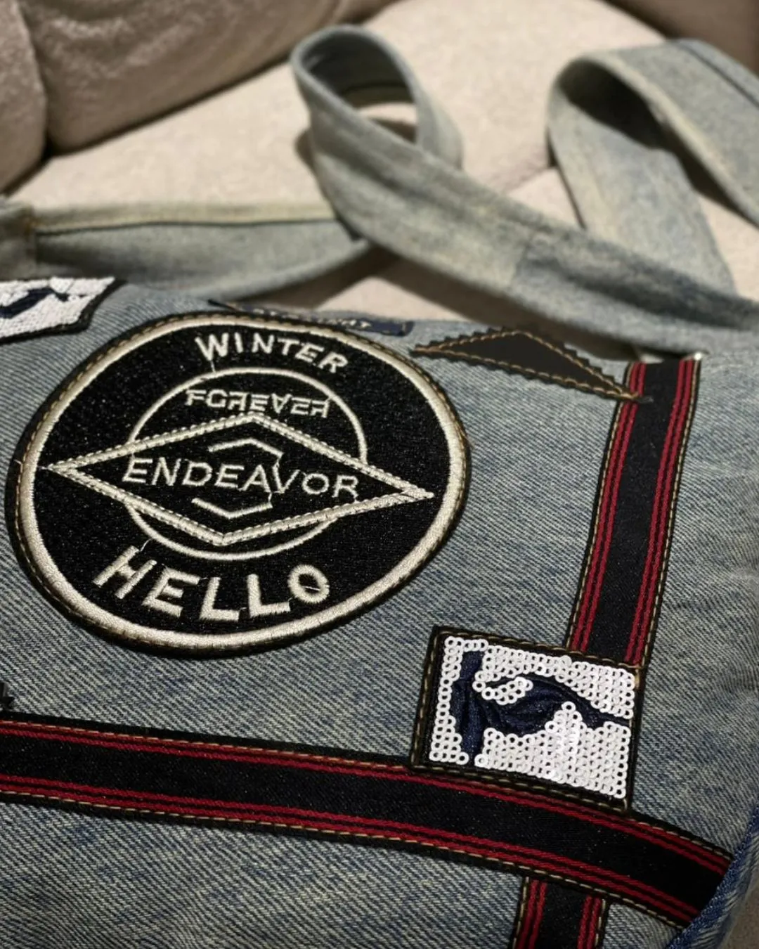 Grab this stylish upcycled denim shoulder bag today. We made it from premium rejected export jeans. It features colorful patches and a secure zipper. The adjustable strap offers great comfort. Upgrade your daily fashion with this unique eco friendly accessory.
