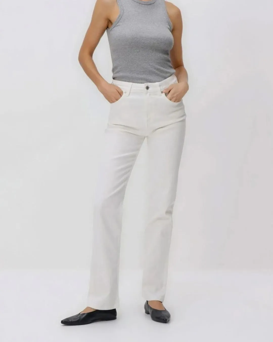 Classic womens white denim jeans with straight fit design for clean modern style. Comfortable durable and easy to pair with everyday outfits.
