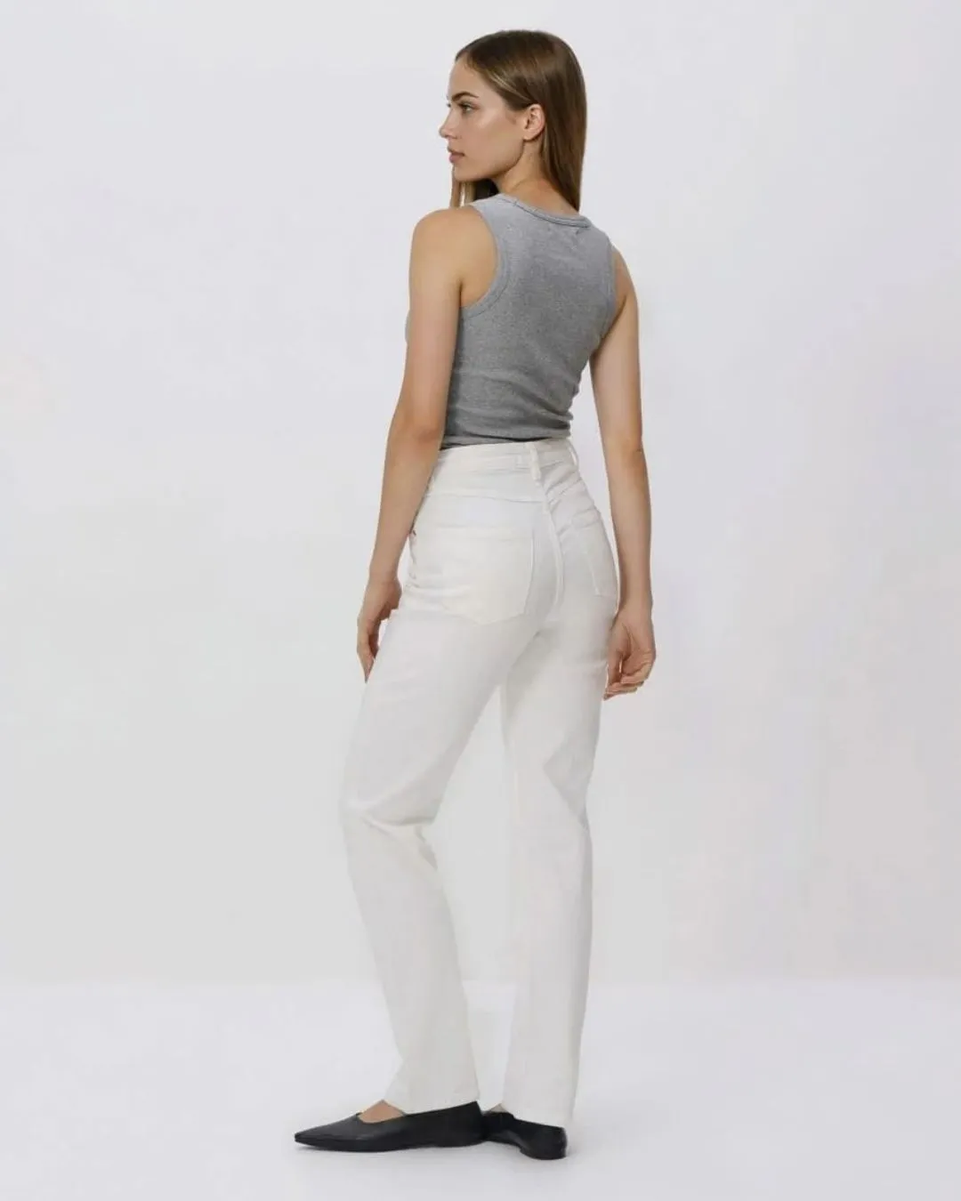Classic womens white denim jeans with straight fit design for clean modern style. Comfortable durable and easy to pair with everyday outfits.