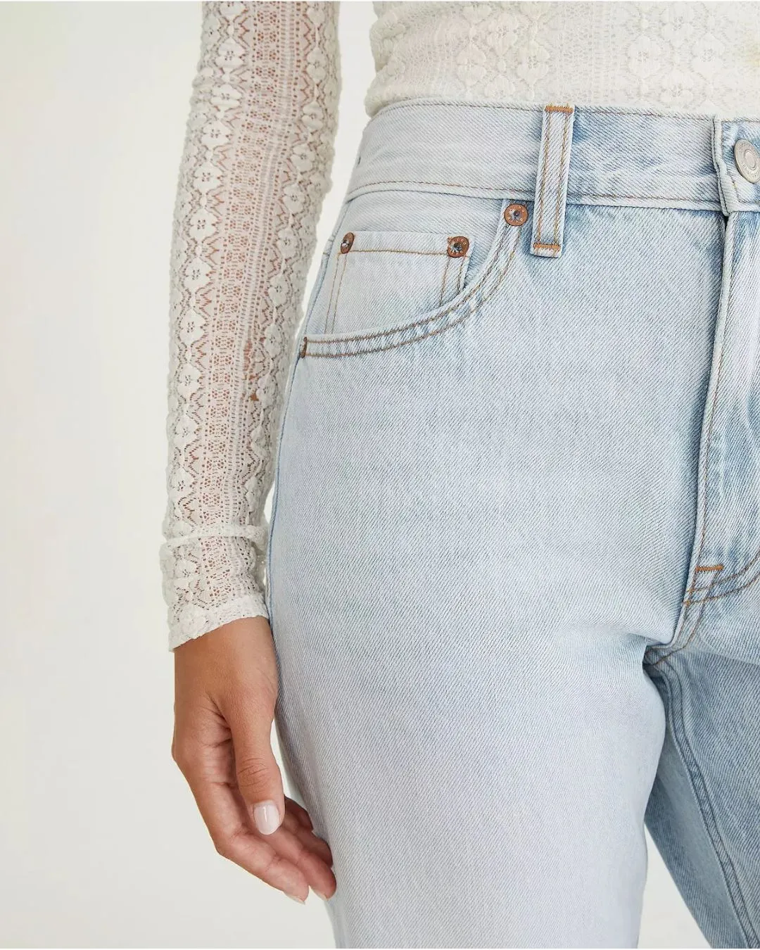 Light wash super high rise baggy jeans inspired by nineties style. Relaxed straight legs create comfort and confident casual fashion for everyday wear.