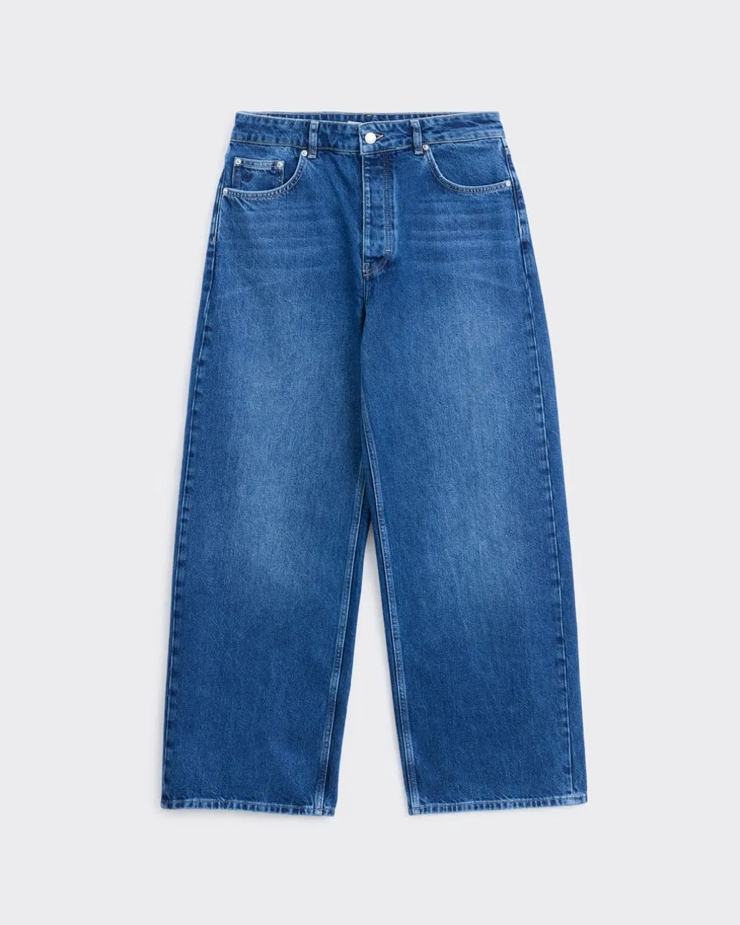 Classic dark blue baggy fit denim jeans designed for relaxed comfort and timeless street style. Durable denim and versatile design make them ideal for everyday casual outfits.