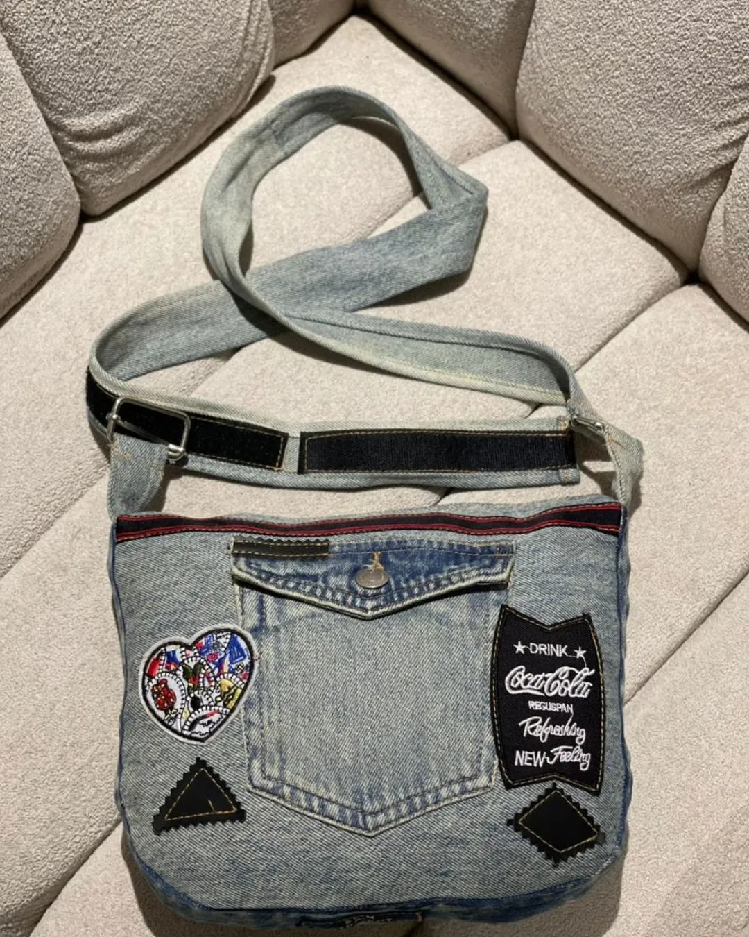Grab this stylish upcycled denim shoulder bag today. We made it from premium rejected export jeans. It features colorful patches and a secure zipper. The adjustable strap offers great comfort. Upgrade your daily fashion with this unique eco friendly accessory.