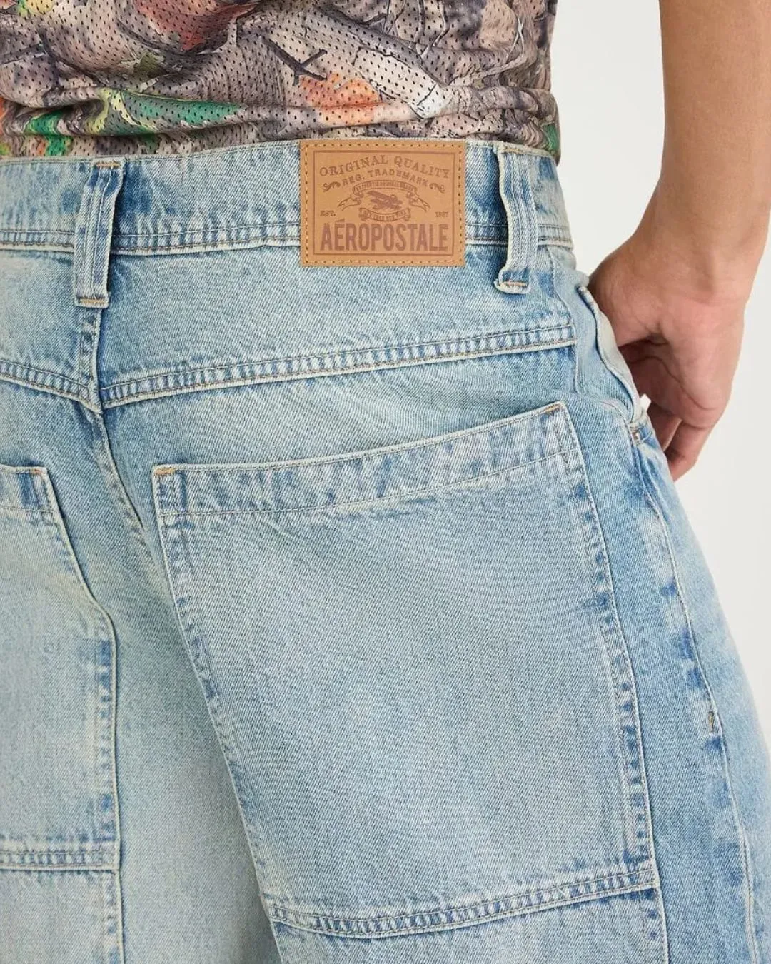 Aeropostale light wash wide leg carpenter utility jeans offer relaxed street style breathable denim comfort and modern everyday fashion for men and women.