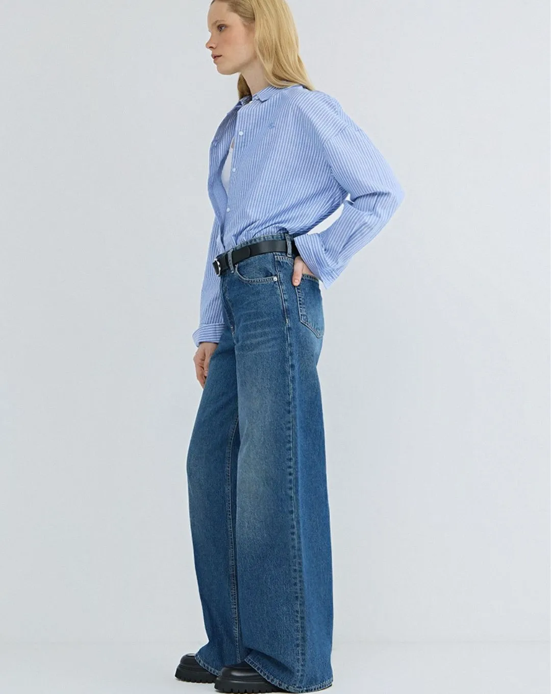 Bold volume meets timeless style with the Woman Ostin Super Wide Leg Denim in dark blue. Designed with a flattering high rise and flowing wide leg fit for confident everyday wear.