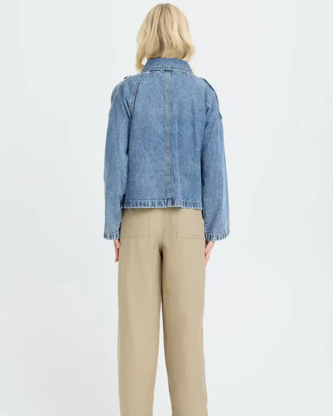 Shop B Young light blue denim jacket for women with cropped fit and double breasted style. Perfect for casual wear and modern everyday outfits.